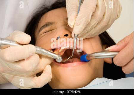 Girl undergoing dental examination Stock Photo