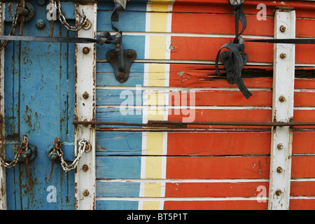 colorful painted boards with hardware - background Stock Photo