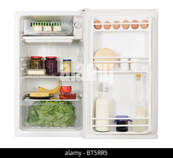 opened refrigerator full of foodstuff Stock Photo