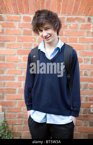 Teenage boy wearing navy blue school uniform Stock Photo