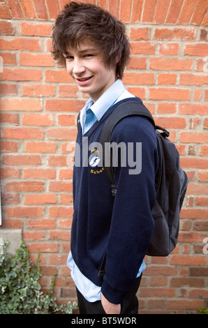 Teenage boy wearing navy blue school uniform Stock Photo