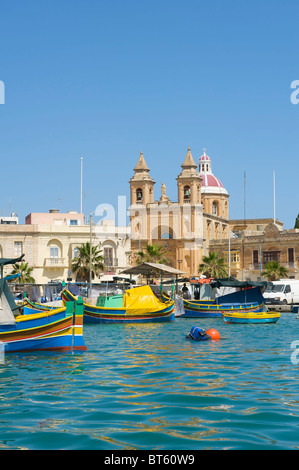 Traditional fishing boats in Marsaxlokk, Malta Stock Photo