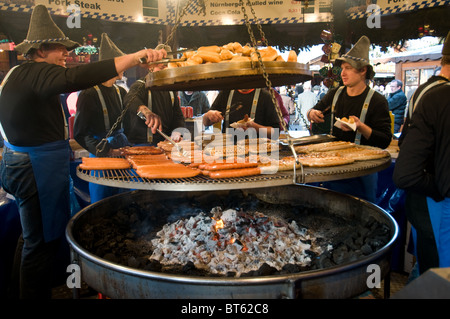 Manchester xmas christmas market England UK United Kingdom GB Great Britain EU European Union Europe Barbeque food stall  Lancas Stock Photo