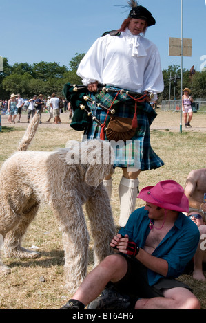 2010 Glastonbury Festival of Contemporary Performing Arts festival stilt walker scot scottish scotland  great dane dog kilt