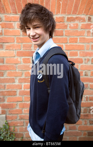 Teenage boy wearing navy blue school uniform Stock Photo