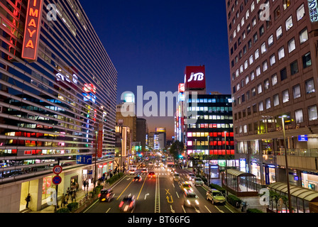 Busy Asian city street in Yokohama, Japan at night. Stock Photo