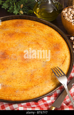 Socca in France, Torta di ceci, cecina, farinata in Italy, (Chickpea pie) (Chickpea crepe) Stock Photo