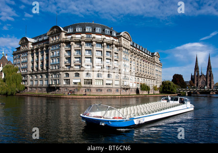 cruise Boat  for sightseeing on the river Ill, Strasbourg, Alsace, France, Europe Stock Photo