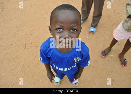 Child in Chelsea football shirt, Ivory Coast, West Africa Stock Photo