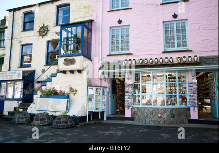 Polperro, Cornwall, UK. Gift shop and whitewashed cottages in Lansallos ...