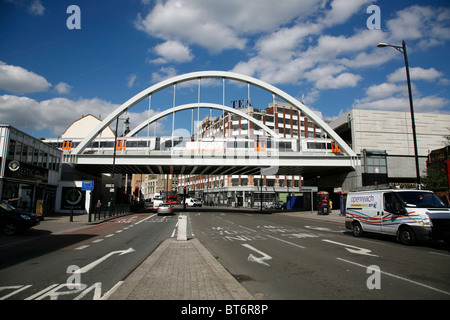 East London line (Overground) train crossing Shoreditch High Street, Shoreditch, London, UK Stock Photo