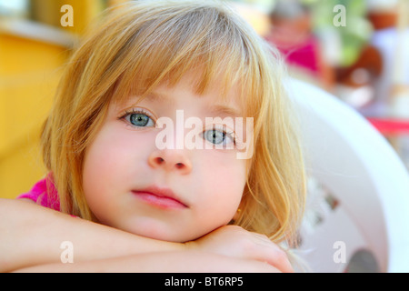 closeup face little blond girl portrait smile blue eyes Stock Photo