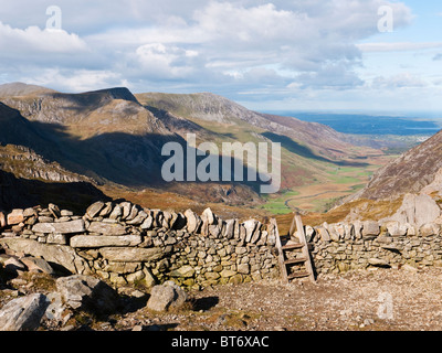 View down Nant Ffrancon from Bwlch Tryfan in Snowdonia. Foel Goch & Carnedd y Filiast in view on the left of the valley Stock Photo