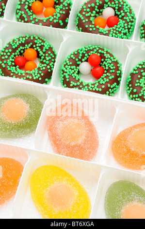 Fontant easter baskets and jelly eggs in boxes Stock Photo
