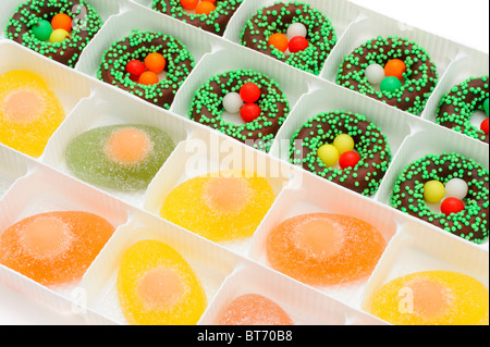 Fontant easter baskets and jelly eggs in boxes Stock Photo