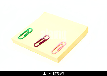 Notes and staples isolated on white background Stock Photo