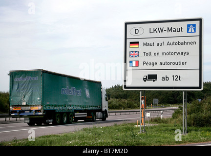 Sign on the E29 motorway, indicating the toll for lorries on German motorways, at the border Germany-Luxembourg near Schengen Stock Photo