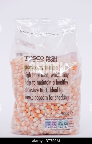 A close up photo of a pack of Tesco popcorn maize for making pop corn against a white background Stock Photo