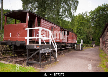 A pair of old goods brake van railway carriages located at High Peak Junction on the Cromford Canal Stock Photo