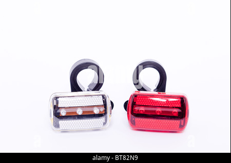 A close up photo of a pair of bicycle lights against a white background Stock Photo