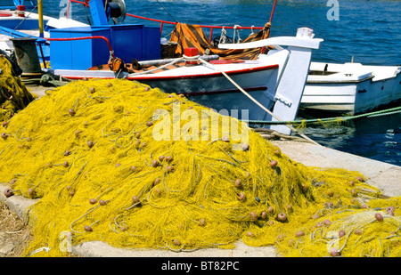 Traditional fishing boats fill large parts of the harbour at Chania in Crete. Stock Photo