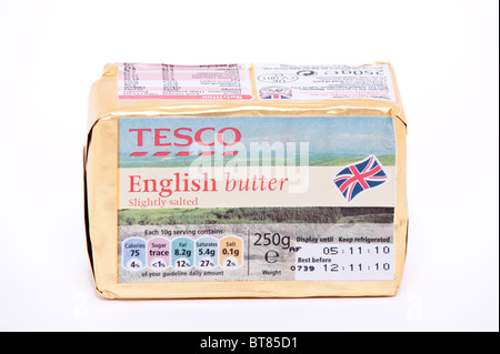 A close up photo of a block of Tesco English butter against a white background Stock Photo