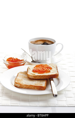 Breakfast, toast with orange marmalade and a cup of coffee Stock Photo