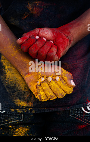 Indian boys multicoloured powdered hands Stock Photo