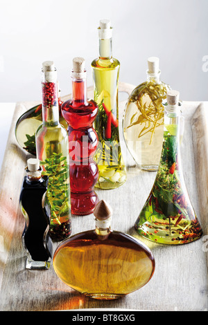 Oil and vinegar varieties with herbs Stock Photo