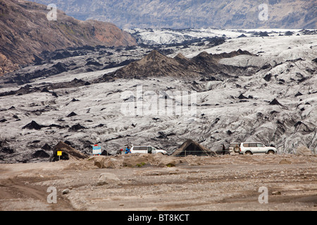 The snout of the Solheimajokull glacier on the Myrdalsjokull ice cap in Iceland, covered in ash from Eyjafjallajokull eruption. Stock Photo