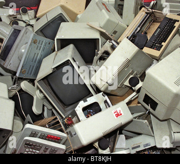 Redundant computer equipment in a skip Stock Photo