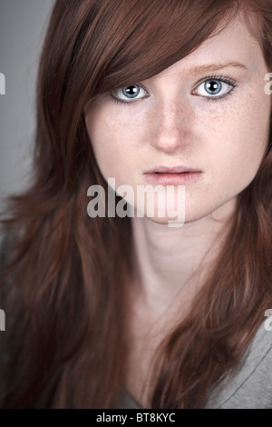 Shot of a Beautiful Red Headed Teenage Girl Stock Photo