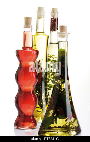 Oil and vinegar varieties with herbs Stock Photo
