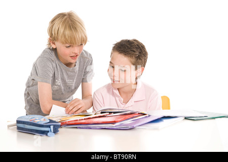Two boys doing their homework Stock Photo