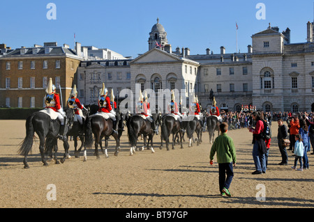 Life Guards Household Cavalry Mounted Regiment soldiers wearing cuirass during changing guard ceremony on Horse Guards Parade Ground London England UK Stock Photo