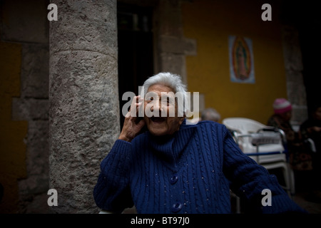 Isabel Alarcon, 99, smiles in Our Lady of Guadalupe Home for the Elderly, Mexico City, September 25, 2010. Stock Photo