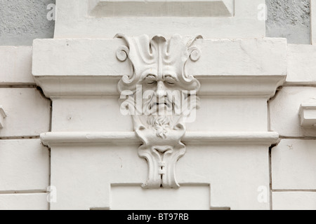 Face on the facade in the courtyard of Esterházy Palace, Eisenstadt, Burgenland, Austria, Europe Stock Photo