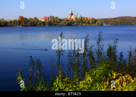 Ratzeburg Domsee lake with the Ratzeburger Dom cathedral and the former mansion, now county museum, on the Dominsel island, Stock Photo