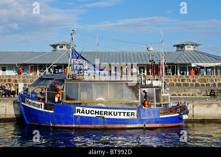 Sale of fresh and smoked fish on the smoking cutter in the Baltic resort Sassnitz, Jasmund peninsula, Ruegen Island