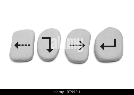 Pebbles with Arrow Signs Stock Photo