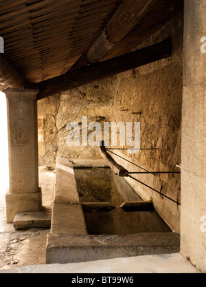 An old washing trough in Cucuron, Vaucluse, Provence France. Washing troughs are called laverie in French Stock Photo