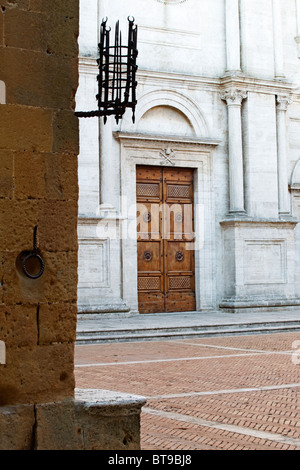 Pienza, Tuscany, Italy - View of the Cathedral in the town square - Palazzo Piccolomini Stock Photo