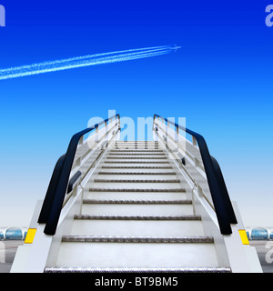 frontal view of white ramp in airport and fly away plane Stock Photo