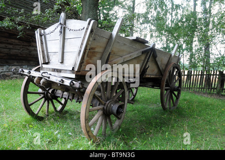 Very old wooden rustic carriage, polish countryside Stock Photo
