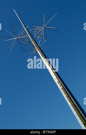 WASHINGTON DC, USA - Created by artist Richard Lippold, the art piece Ad Astra (meaning 'To the Stars') stands outside the National Mall side entrance of the Smithsonian's Air and Space Museum. At 100 feet tall, it is made of polished stainless steel. Stock Photo