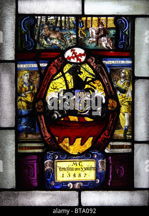 Stained glass panel with Joahim von Hausen's coat of arms and hunting scene (1587). Museum of Architecture, Wroclaw. Stock Photo