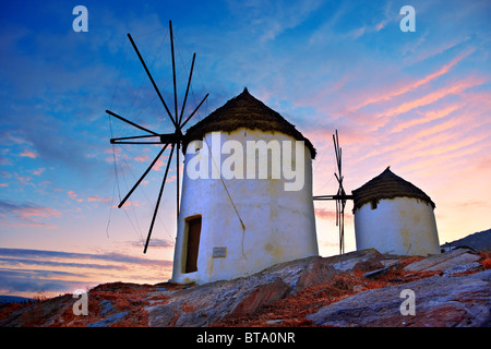 The Windmills overlooking Chora town. Ios Cylcades Islands, Greece. Stock Photo