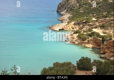 The crystal clear and turquoise water of the Mediterranean sea at Istria Bay in northern Crete, Greece Stock Photo