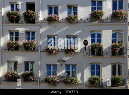 France, Paris, Carrefour de l'Odéon, windows with flowers, Stock Photo