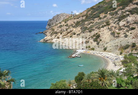 The small harbour and sandy beach at Istria Bay, northern Crete, Greece Stock Photo